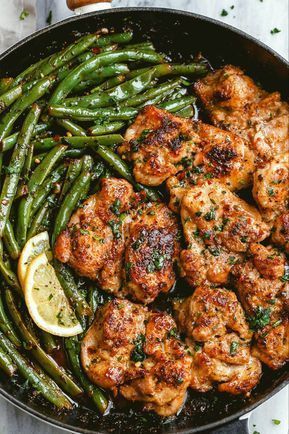  A vibrant kitchen scene with a family joyfully engaging in the preparation of keto-friendly meals. 